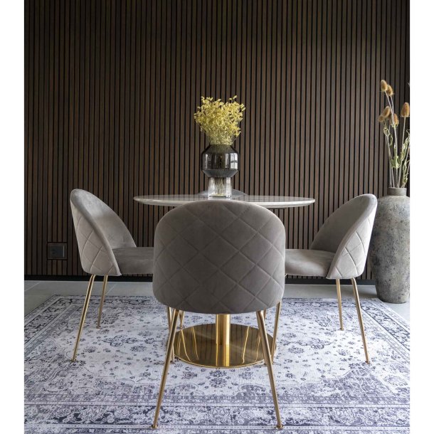 Greve spisebordsstol i gr velour med sklformet ryg og kraftig metalstel i messinglook.